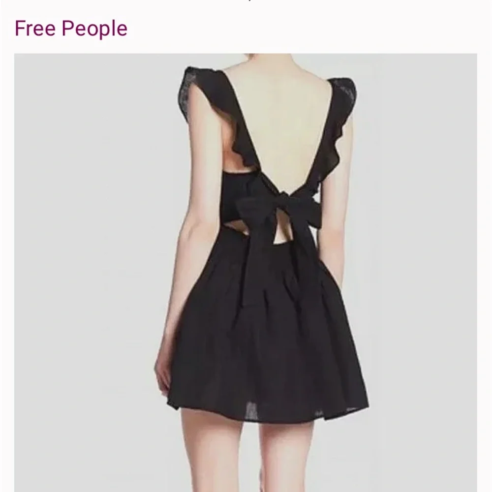 Free People linen blend beautiful ruffled back tie mini boho dress. - Picture 3 of 14